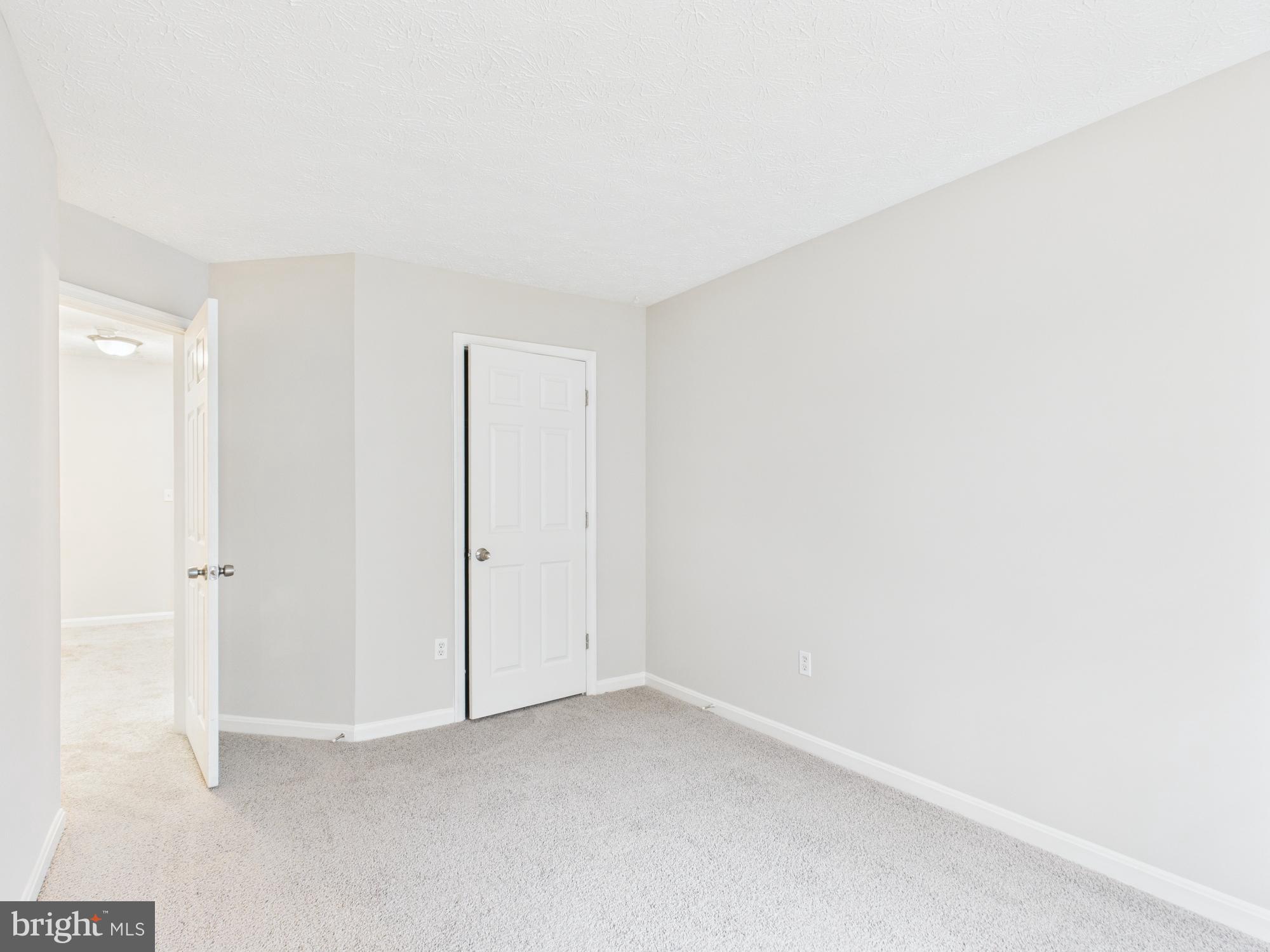 8067 Brookstone Court, Unit 100 Severn, MD 21144 - Photo 19 of 36 a view of an empty room