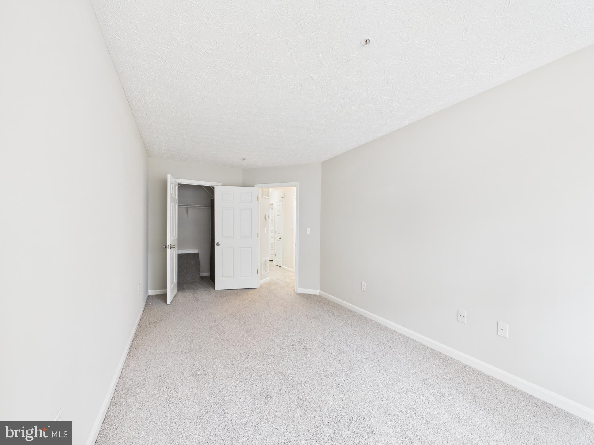 8067 Brookstone Court, Unit 100 Severn, MD 21144 - Photo 24 of 36 a view of an empty room