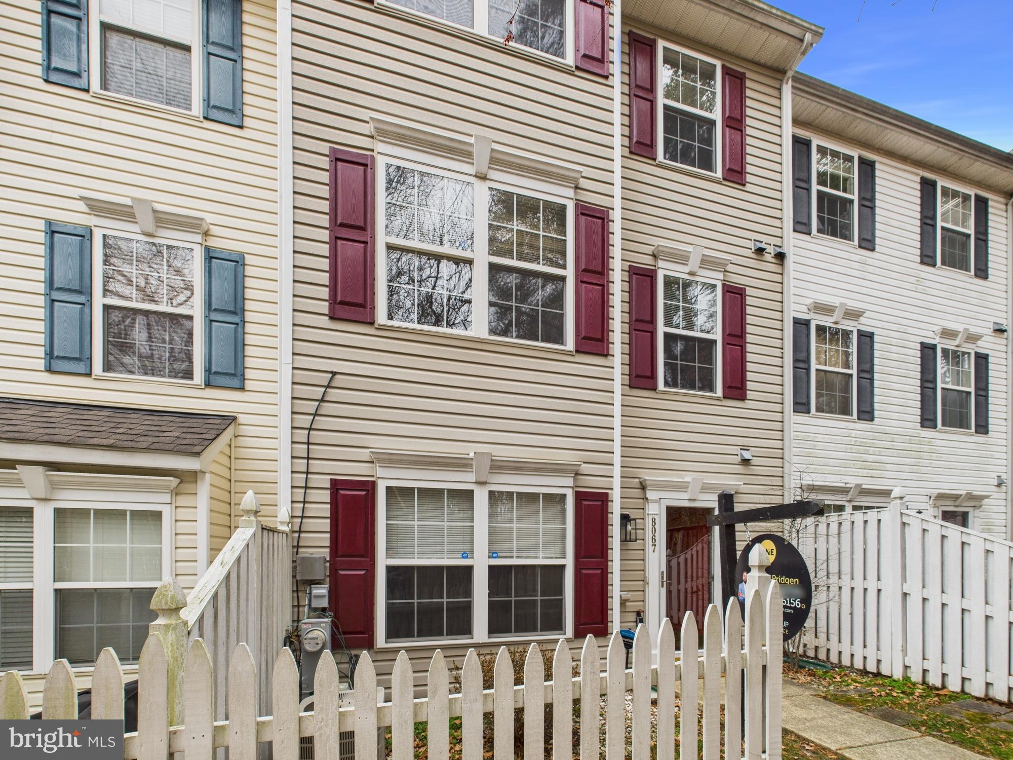8067 Brookstone Court, Unit 100 Severn, MD 21144 - Photo 36 of 36 a front view of a house