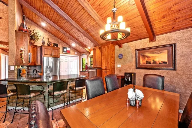 a outdoor space with wooden floor and furniture