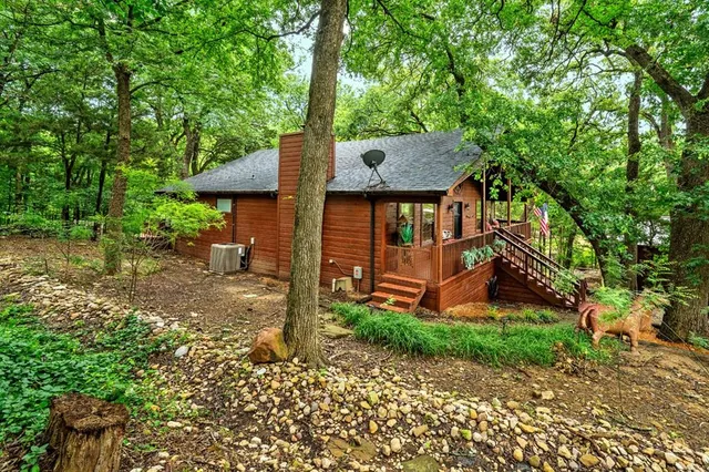a view of a chairs in a backyard