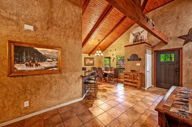 a view of a hallway with seating area