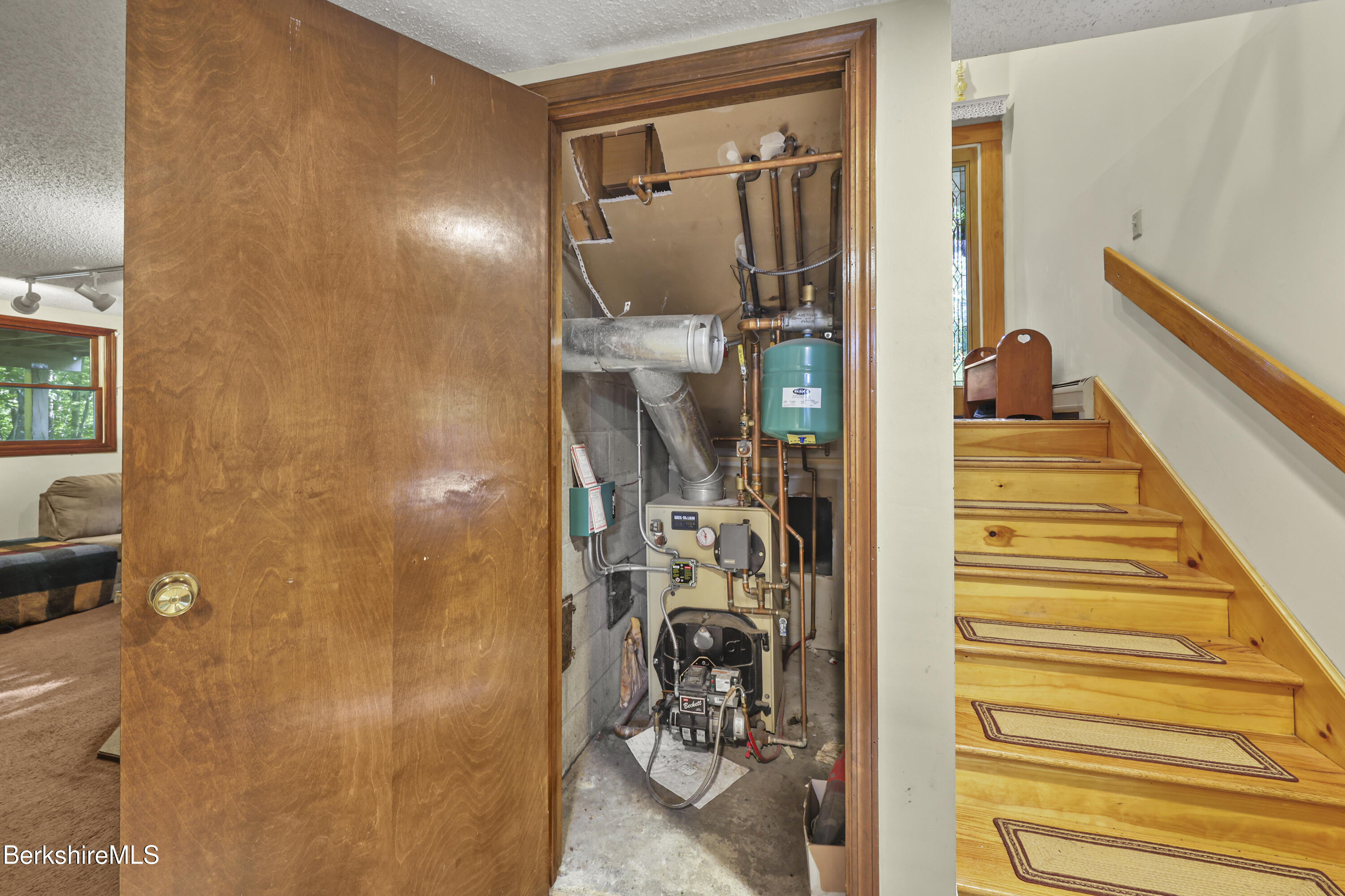 156 Bailey Road Lanesborough, MA 01237 - Photo 34 of 49 Furnace hidden away