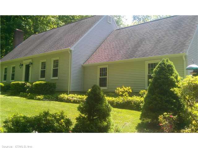 a view of a house with a garden