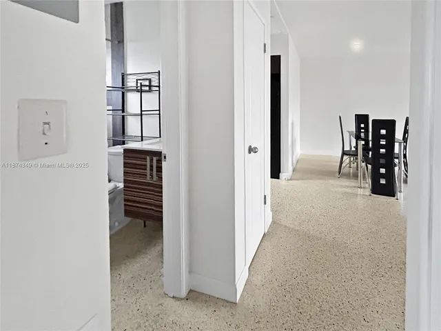 a view of livingroom with furniture and window