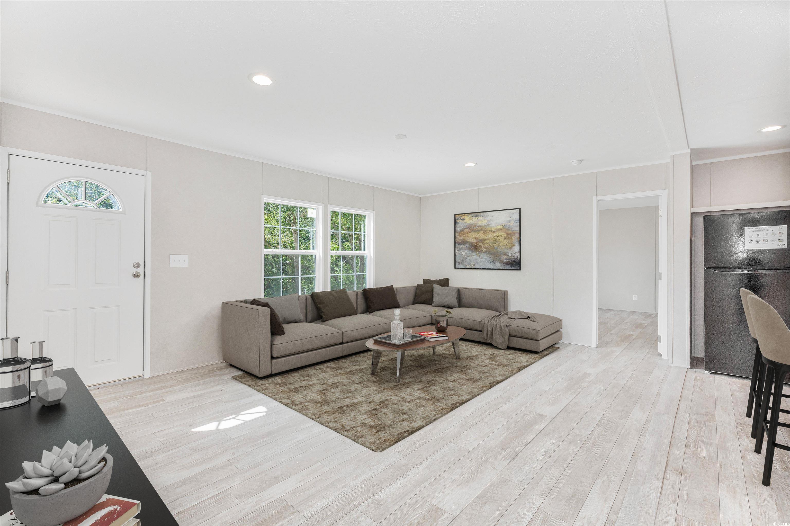 398 West Canal Street Murrells Inlet, SC 29576 - Photo 13 of 40 Living room featuring a wealth of natural light, c