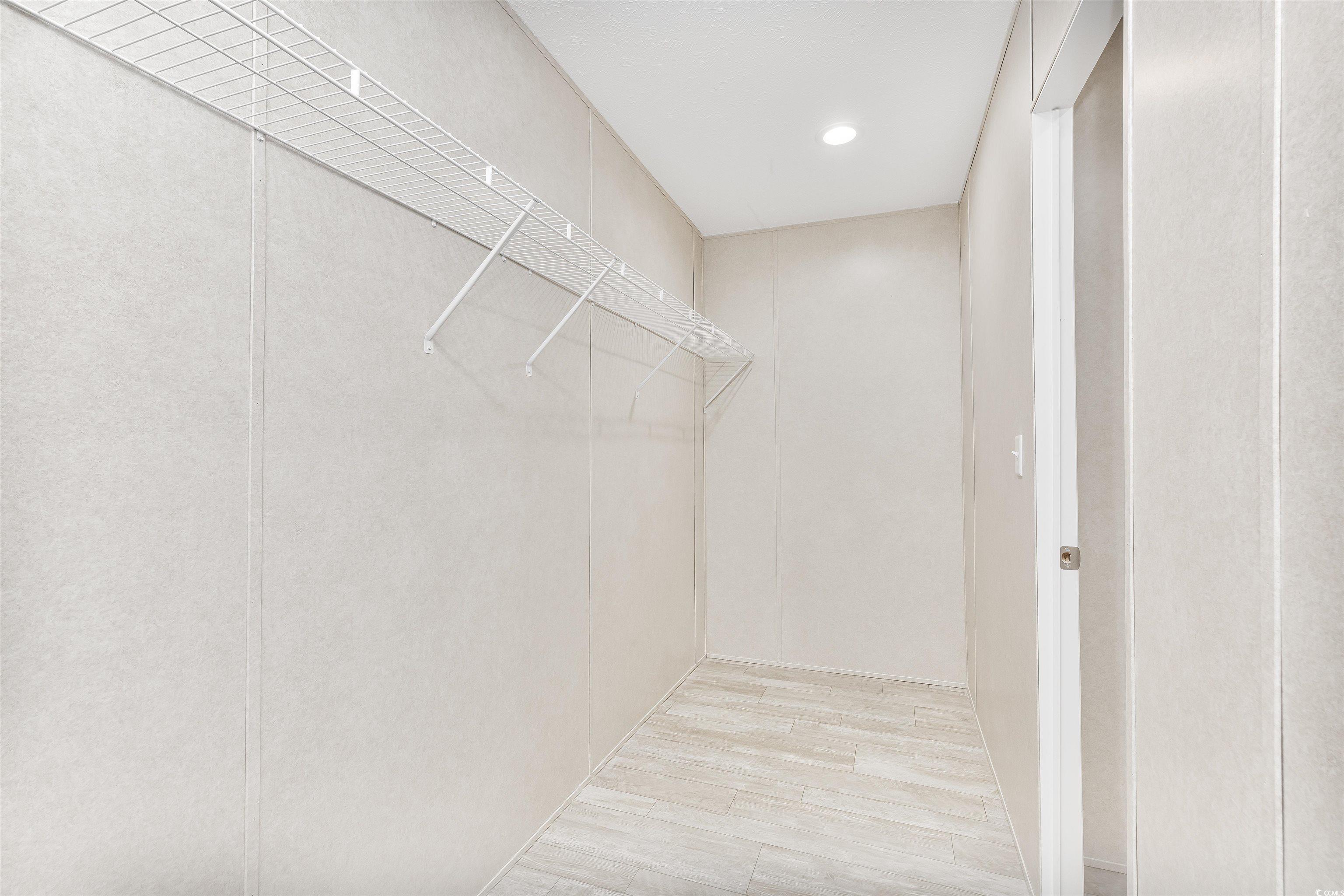 398 West Canal Street Murrells Inlet, SC 29576 - Photo 23 of 40 Spacious closet featuring light wood-type flooring