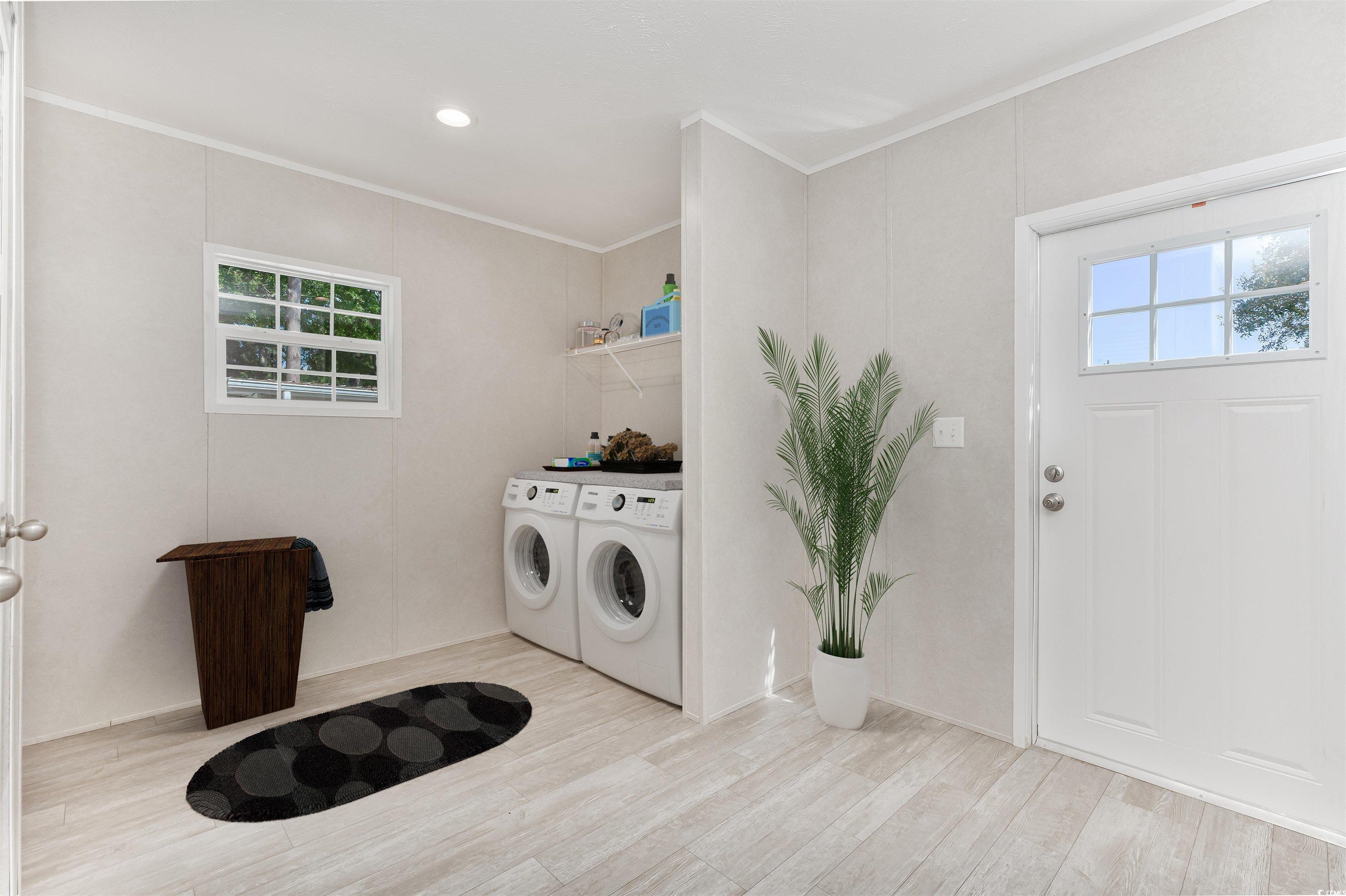 398 West Canal Street Murrells Inlet, SC 29576 - Photo 26 of 40 Laundry room featuring washer and dryer, crown mol