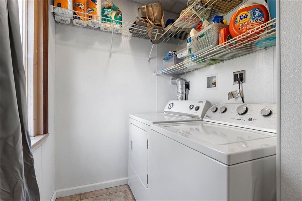 403 Ormsby Avenue Pittsburgh, PA 15210 - Photo 16 of 32 a utility room with dryer and washer