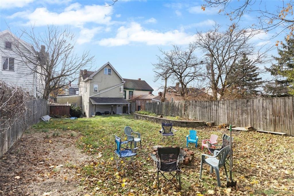 403 Ormsby Avenue Pittsburgh, PA 15210 - Photo 29 of 32 a front view of house with yard and seating space