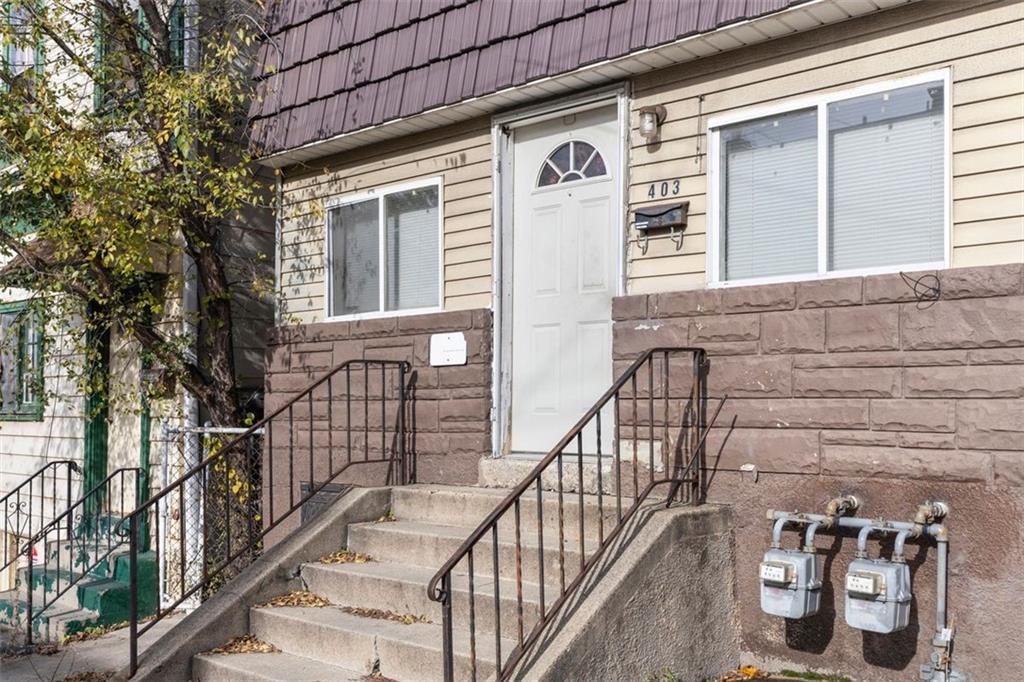 403 Ormsby Avenue Pittsburgh, PA 15210 - Photo 4 of 32 a view of a porch with seating space