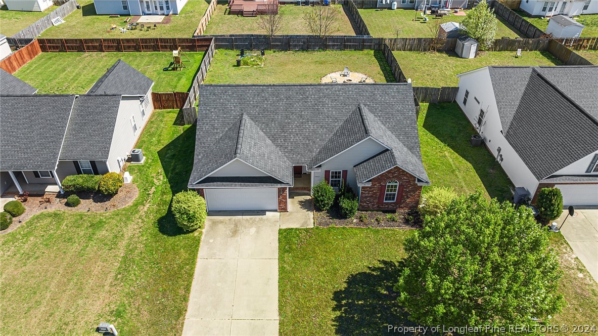 1949 Yellowbrick Road Fayetteville, NC 28314 - Photo 32 of 34 an aerial view of a house with a garden
