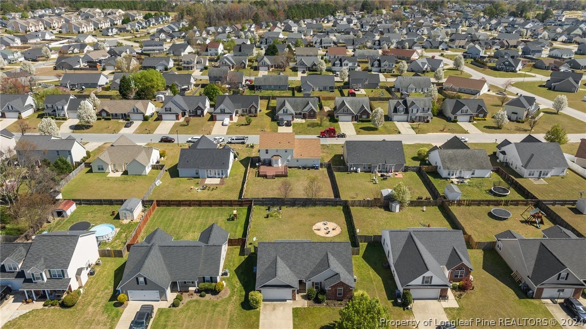 1949 Yellowbrick Road Fayetteville, NC 28314 - Photo 34 of 34 an aerial view of residential houses with outdoor space