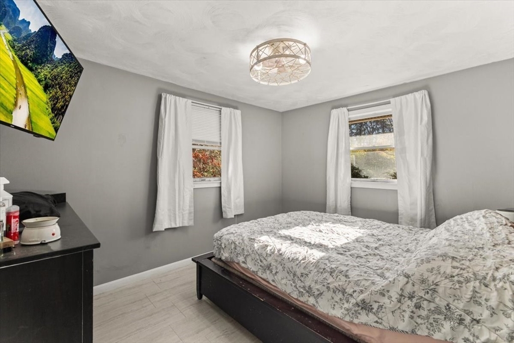 40 Christopher Road Brockton, MA 02302 - Photo 16 of 28 a bedroom with a bed and a window