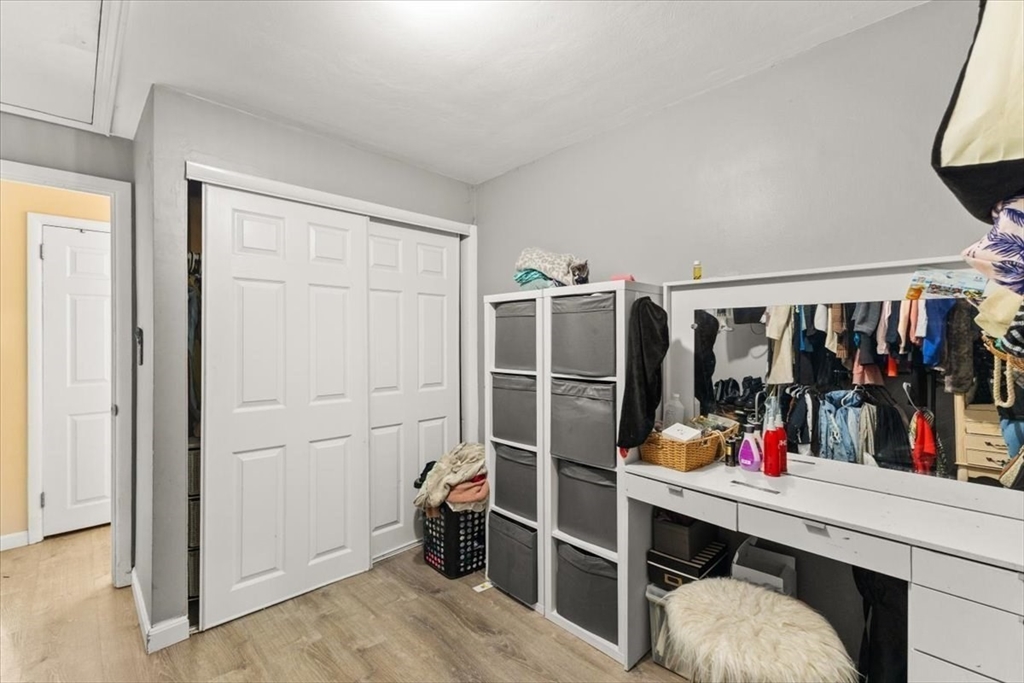 40 Christopher Road Brockton, MA 02302 - Photo 17 of 28 a view of walk in closet with clothes and shoes