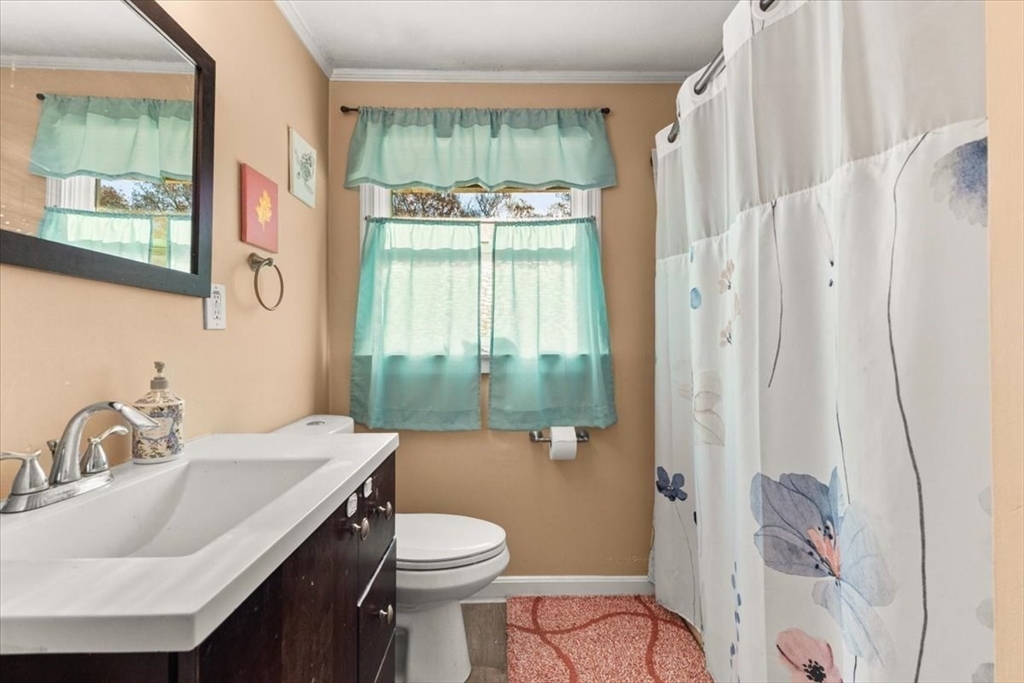 40 Christopher Road Brockton, MA 02302 - Photo 9 of 28 a bathroom with a sink toilet and shower