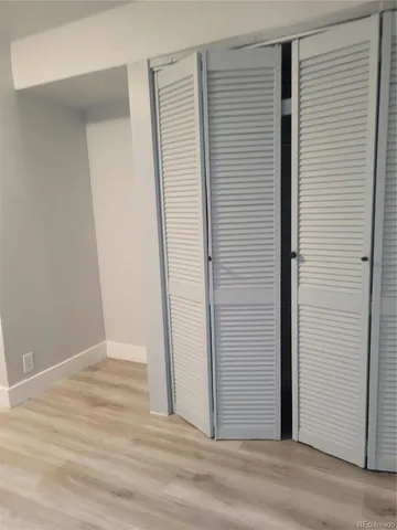 a view of a room with wooden wall