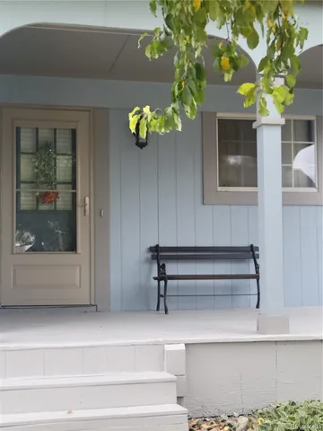 a view of entryway with a flower pot