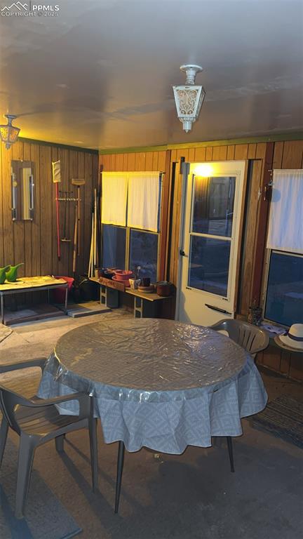 1041 Florence Avenue Colorado Springs, CO 80905 - Photo 15 of 27 Dining area with wood walls