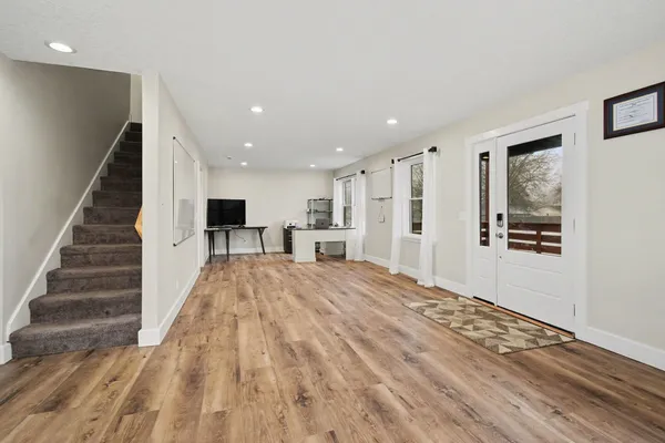 a living room with furniture and a table