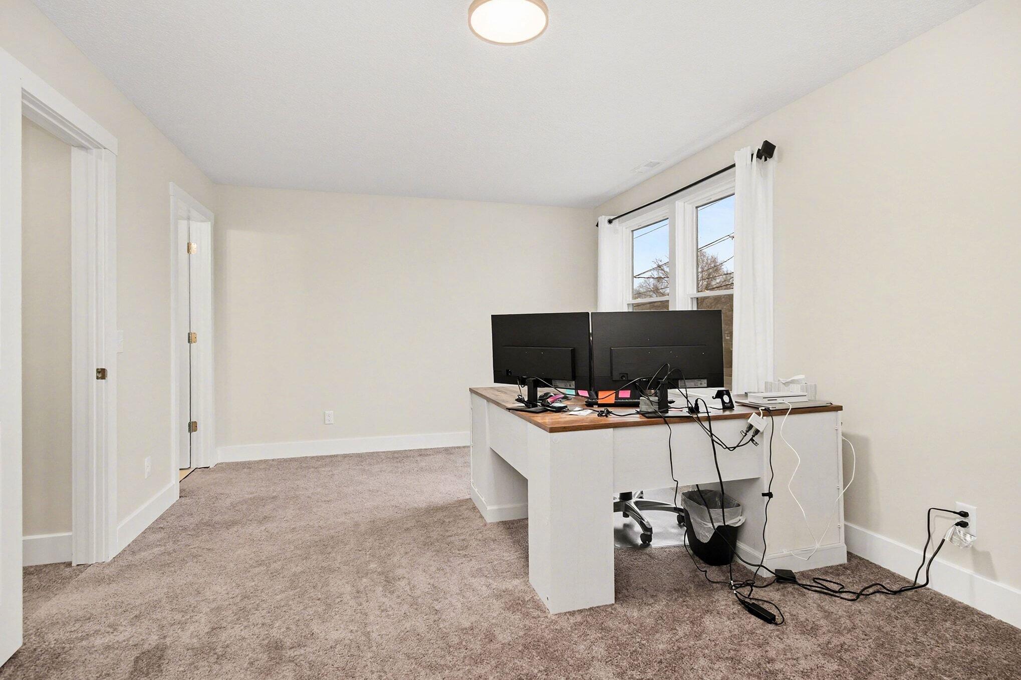 5317 Stellhorn Road Fort Wayne, IN 46815 - Photo 21 of 29 a living room with furniture and a flat screen tv