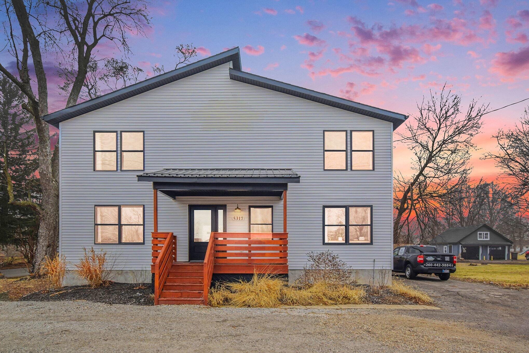 5317 Stellhorn Road Fort Wayne, IN 46815 - Photo 7 of 29 a front view of a house with a yard