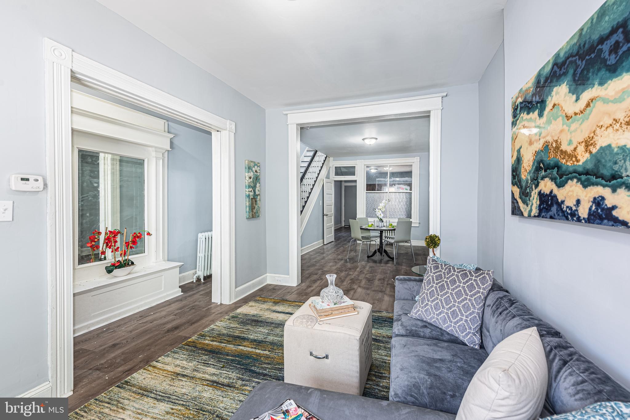 1624 Darley Avenue Baltimore, MD 21213 - Photo 2 of 28 a living room with furniture and painting on the wall