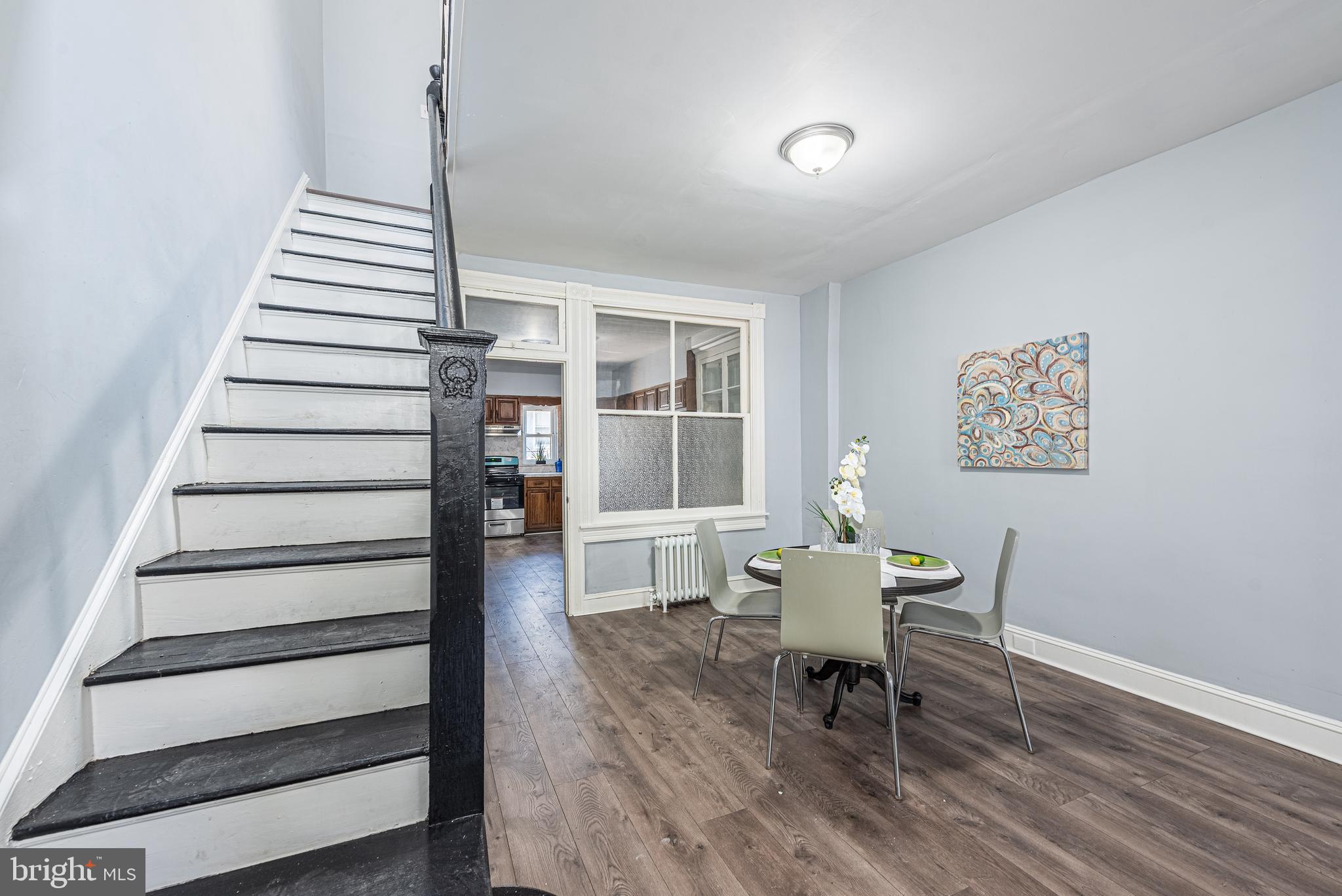 1624 Darley Avenue Baltimore, MD 21213 - Photo 5 of 28 a dining room with furniture and wooden floor