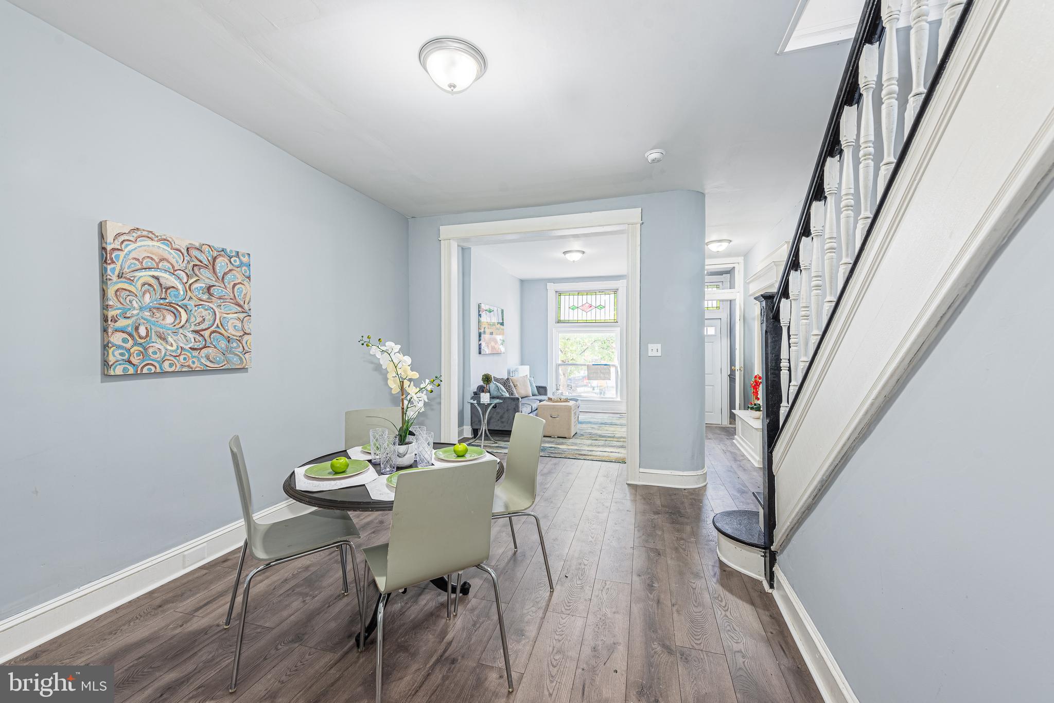 1624 Darley Avenue Baltimore, MD 21213 - Photo 6 of 28 a view of a dining room with furniture and wooden floor