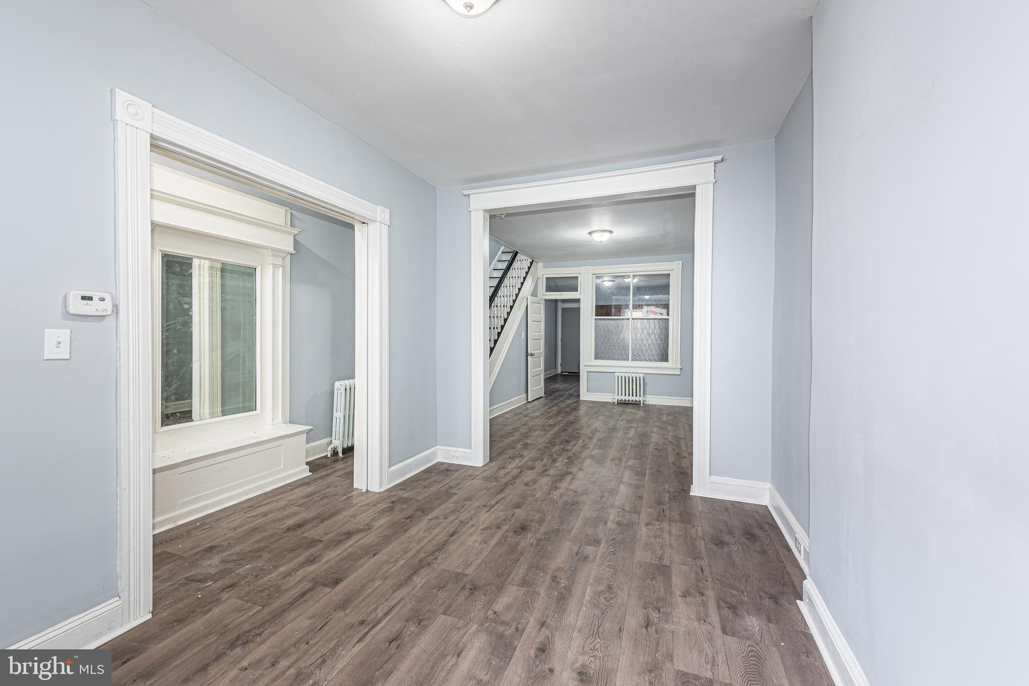 1624 Darley Avenue Baltimore, MD 21213 - Photo 10 of 28 a view of a hallway with wooden floor