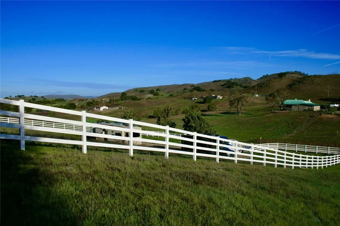 730 My Los Alamos, CA 93440 - Photo 18 of 23 a view of a yard with wooden fence