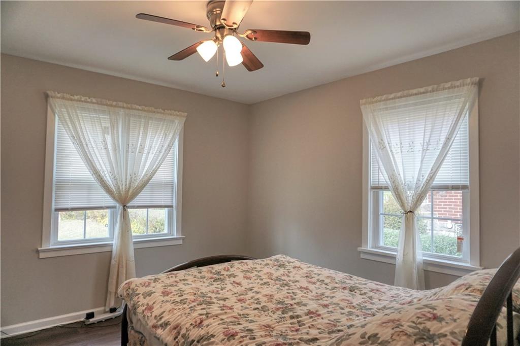 215 Freeport Road Butler, PA 16002 - Photo 14 of 25 a bedroom with a bed and a window