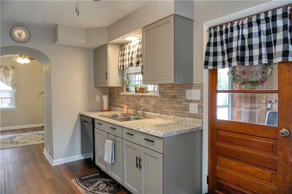 215 Freeport Road Butler, PA 16002 - Photo 6 of 25 a kitchen with a sink and a stove