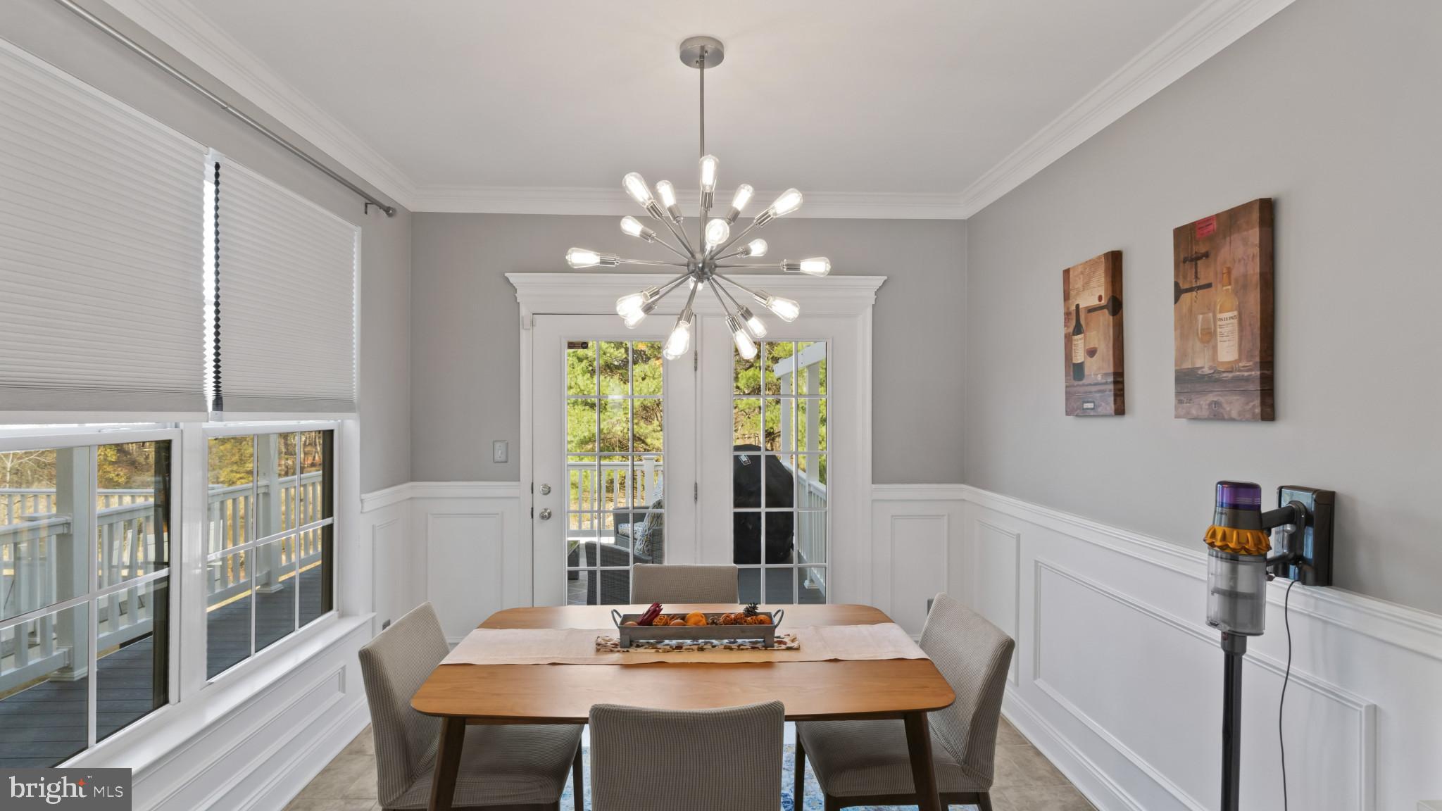 526 Callander Way Abingdon, MD 21009 - Photo 13 of 40 a view of a dining room with furniture window and wooden floor