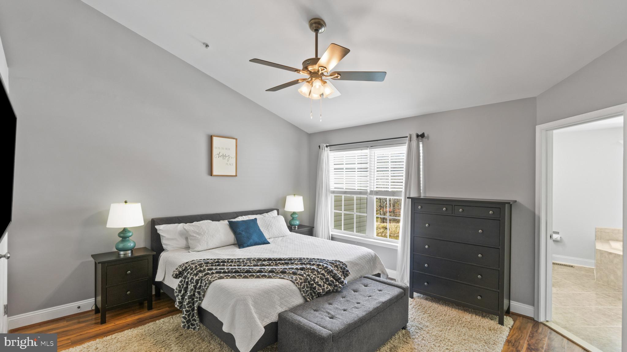 526 Callander Way Abingdon, MD 21009 - Photo 14 of 40 a bedroom with a bed and a window