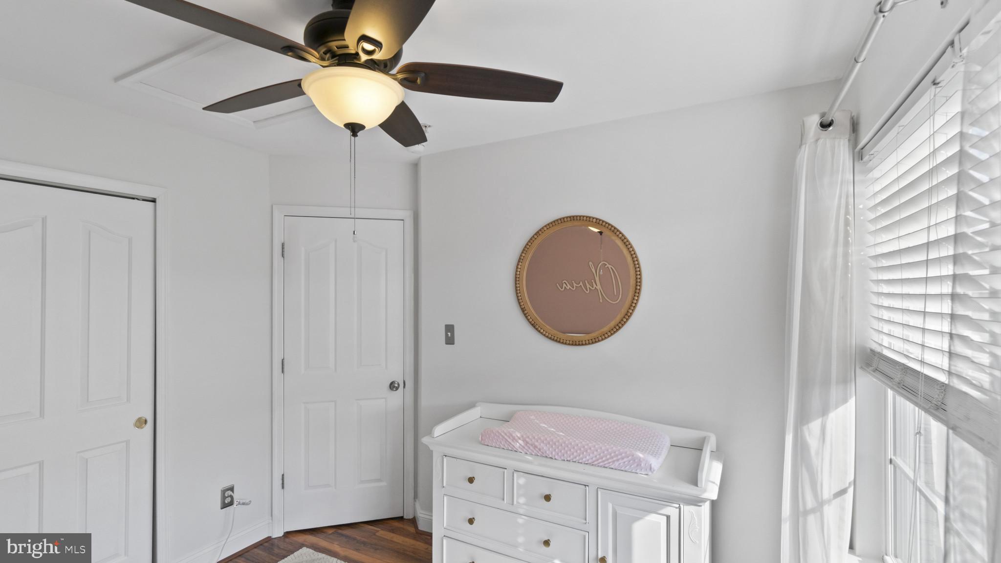 526 Callander Way Abingdon, MD 21009 - Photo 23 of 40 a bedroom with a bed and a chandelier