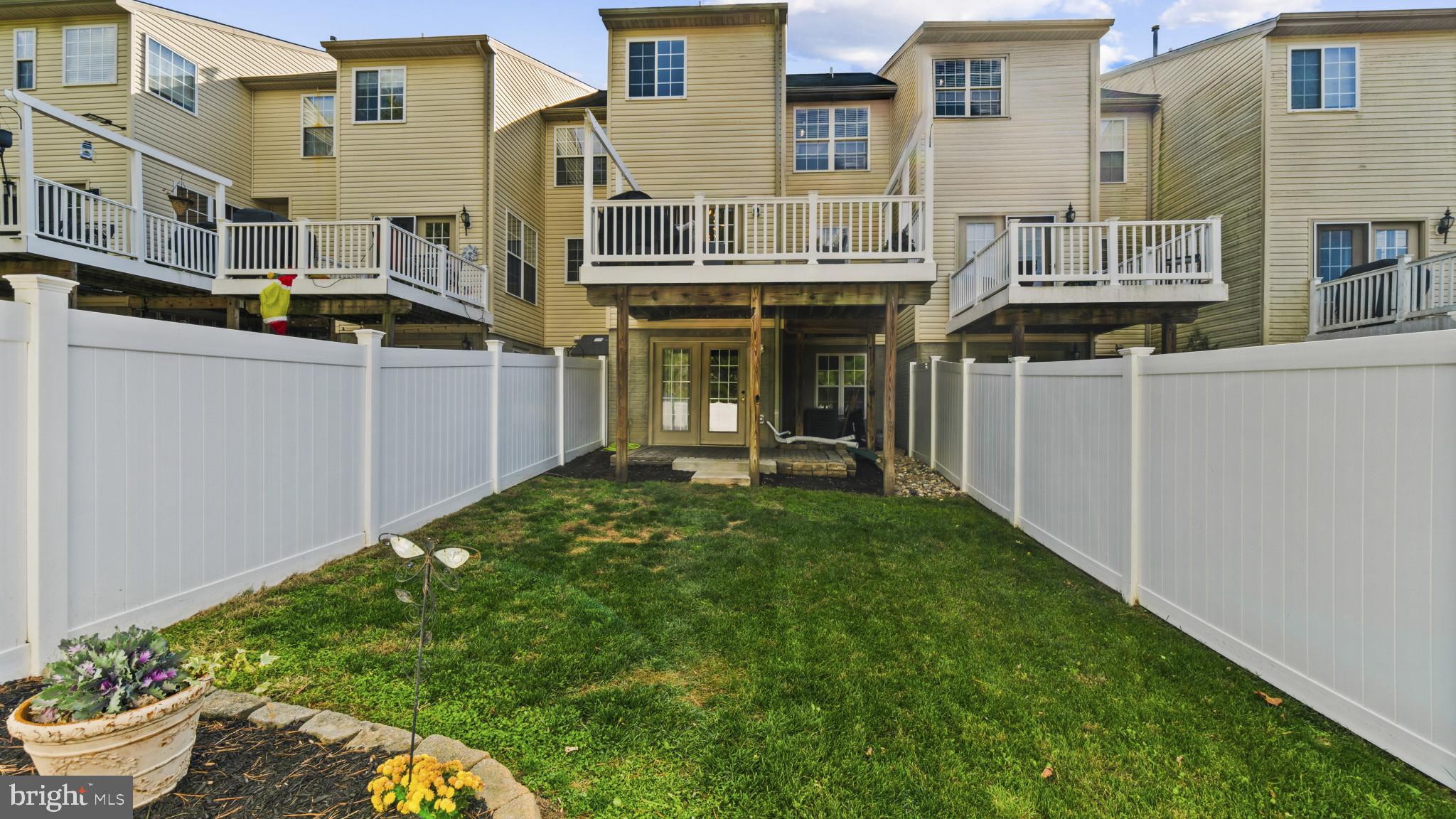 526 Callander Way Abingdon, MD 21009 - Photo 33 of 40 a view of a house with backyard and sitting area