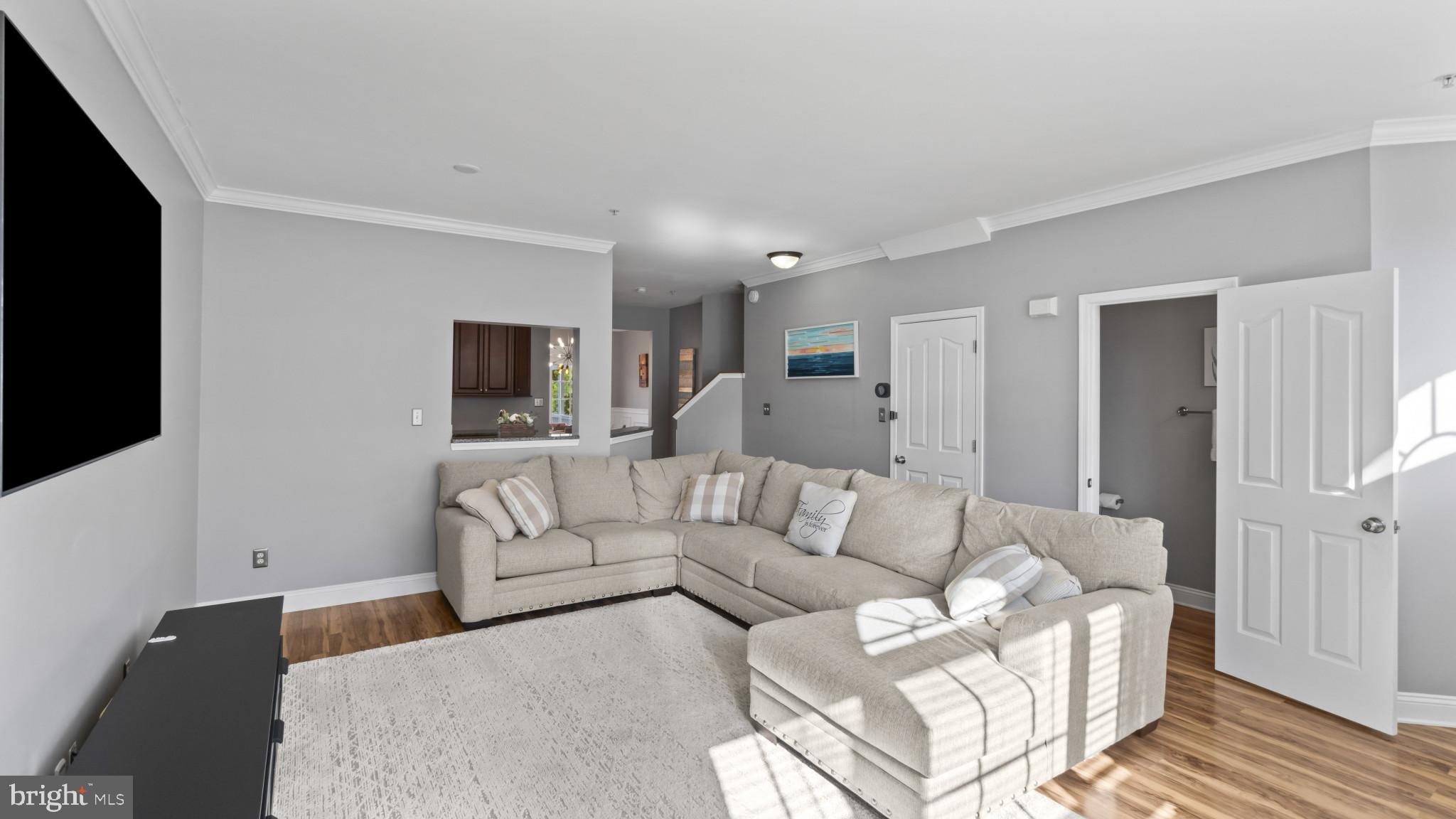 526 Callander Way Abingdon, MD 21009 - Photo 5 of 40 a living room with furniture and a flat screen tv