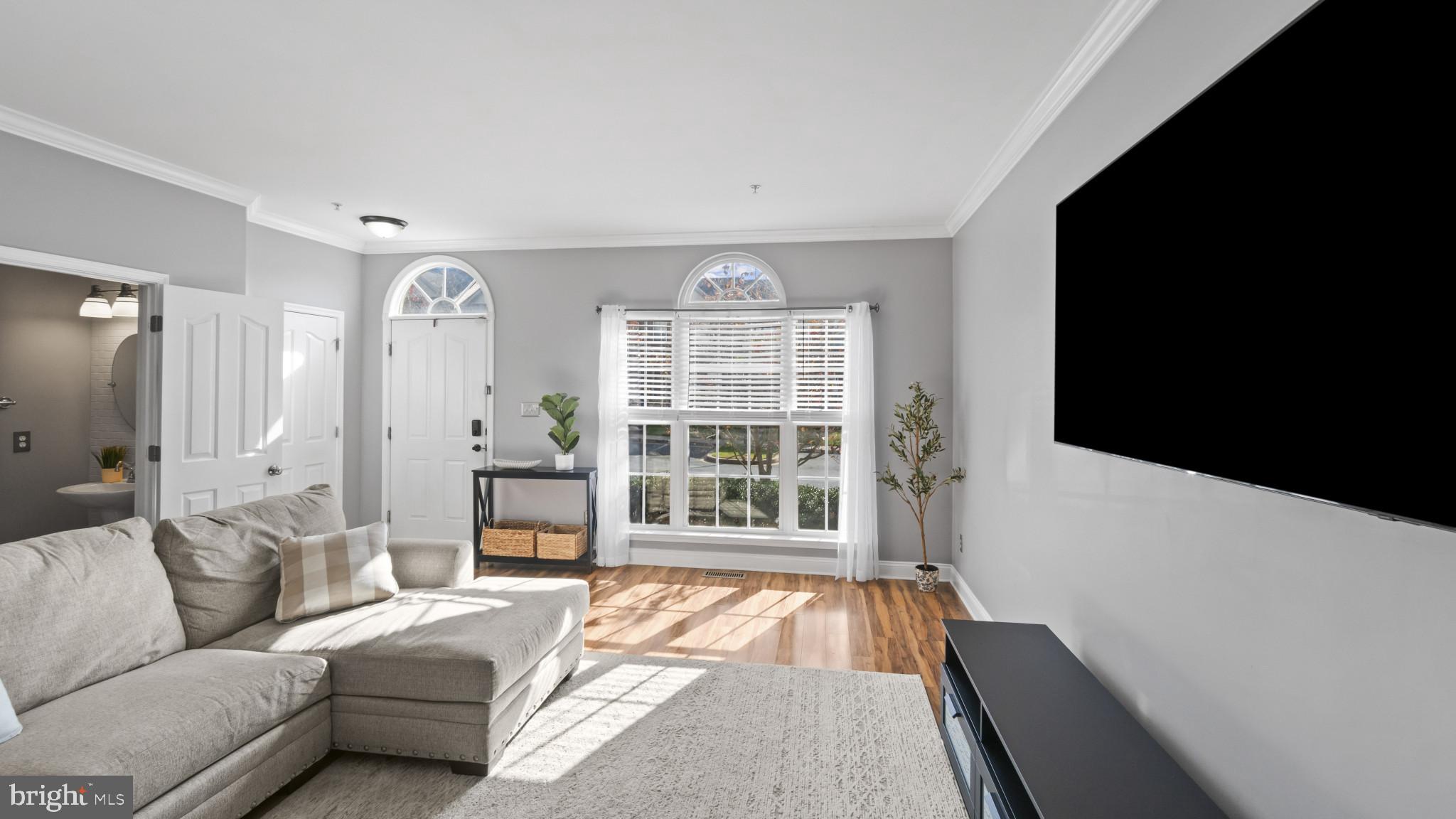 526 Callander Way Abingdon, MD 21009 - Photo 6 of 40 a living room with furniture and a large window