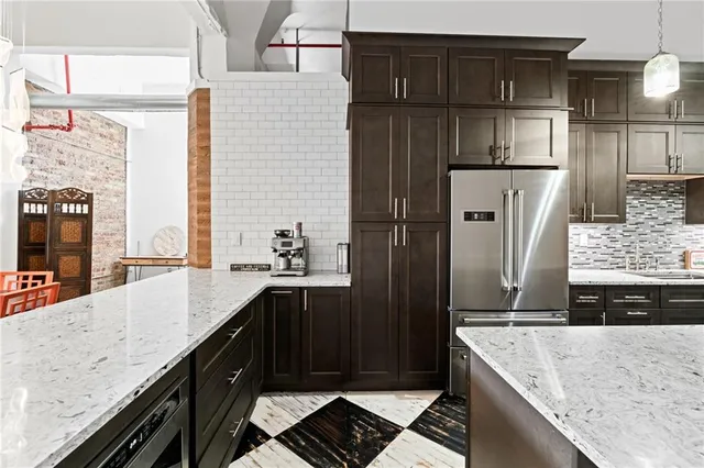 a kitchen with a sink and cabinets