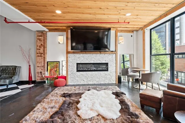 a view of a hallway with wooden shelves