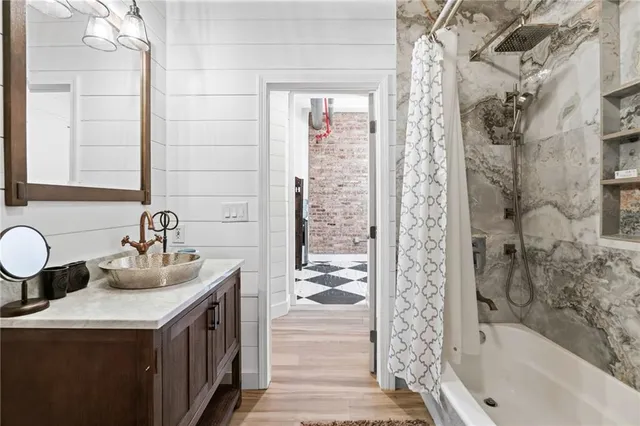 a bathroom with a sink and a mirror