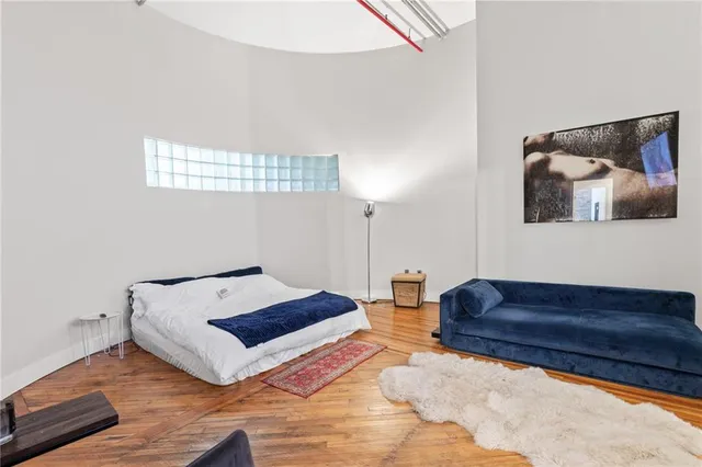 a living room with furniture flat screen tv and a fireplace