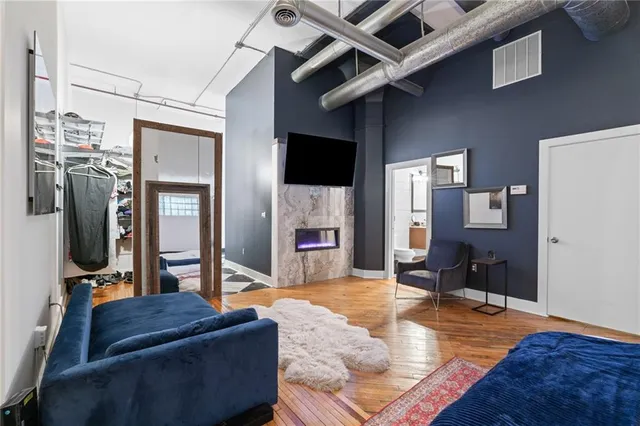 a view of bathroom with wooden floor
