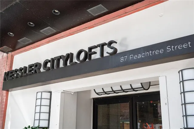 a view of balcony with a potted plants