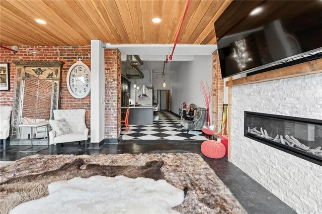 a kitchen with a stove and a fireplace