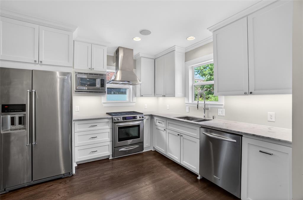 4009 Prescott Avenue Dallas, TX 75219 - Photo 8 of 39 white marble kitchen with all the appointments
