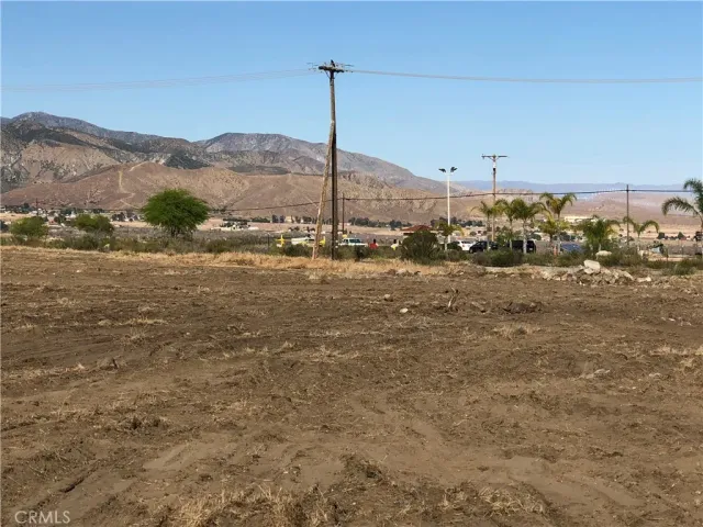 a view of a ocean with a mountain