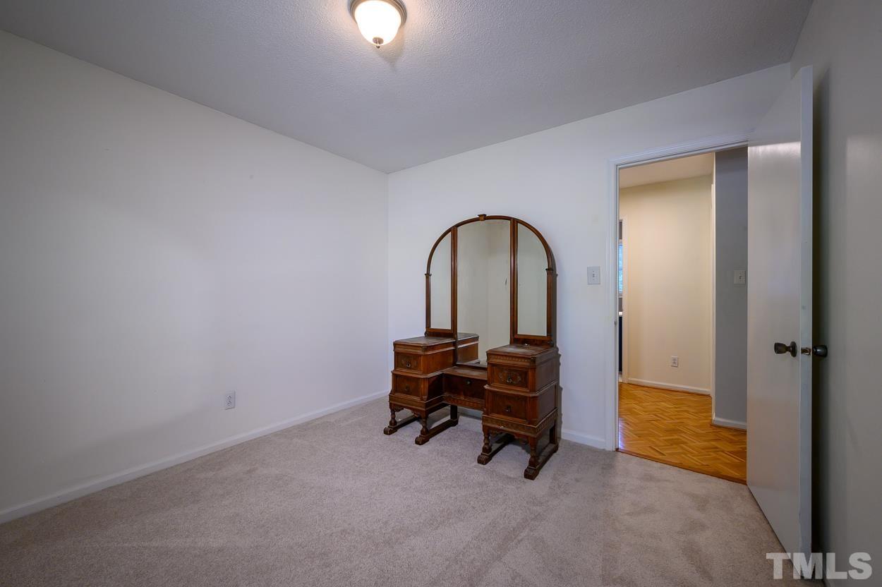 4208 Waterbury Road Raleigh, NC 27604 - Photo 16 of 24 a living room with furniture