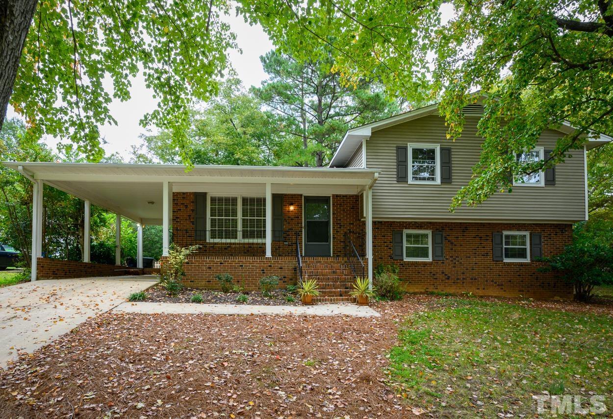 4208 Waterbury Road Raleigh, NC 27604 - Photo 3 of 24 front view of a house with a yard